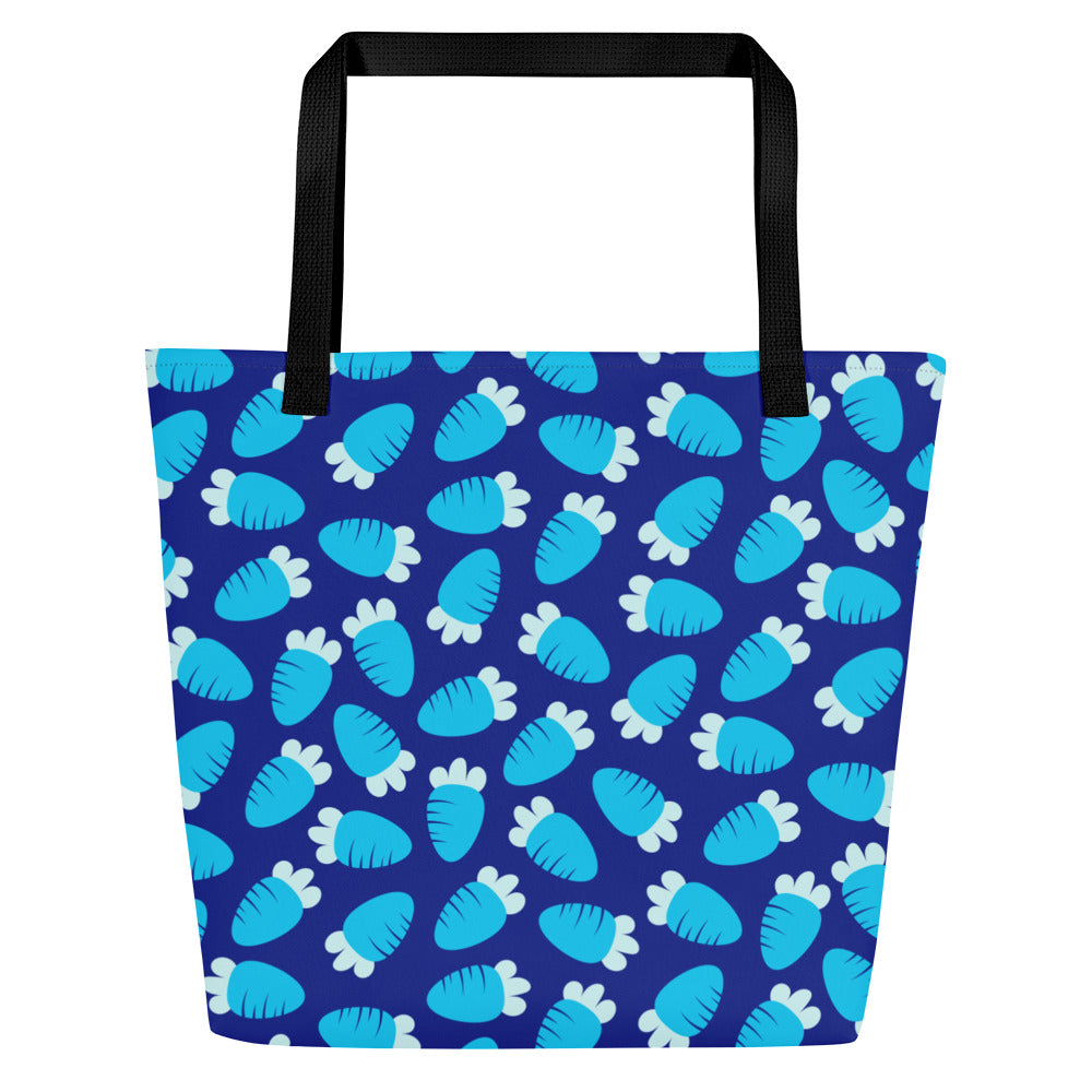 A tote bag with black handles, featuring a vibrant blue background with a playful pattern of light blue carrots with light blue tops. The design is fun and energetic.