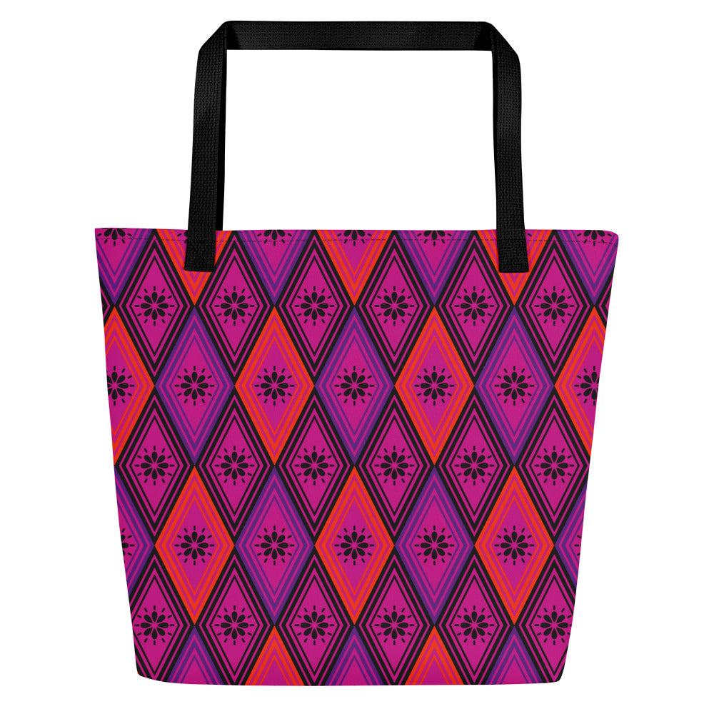Tote bag with black handles, featuring a vibrant diamond pattern. The design alternates between pink and fuchsia, decorated with black starburst floral motifs.