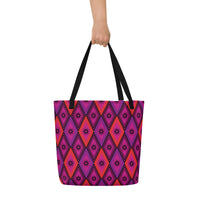 Tote bag with black handles, featuring a vibrant diamond pattern. The design alternates between pink and fuchsia, decorated with black starburst floral motifs.