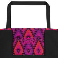 Tote bag with black handles, featuring a vibrant diamond pattern. The design alternates between pink and fuchsia, decorated with black starburst floral motifs.