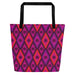Tote bag with black handles, featuring a vibrant diamond pattern. The design alternates between pink and fuchsia, decorated with black starburst floral motifs.