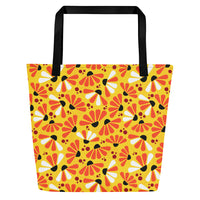 Bright tote bag with black handles, featuring a vibrant pattern of abstract coneflowers in red, white, and black on a sunny yellow background. Playful and energetic design.